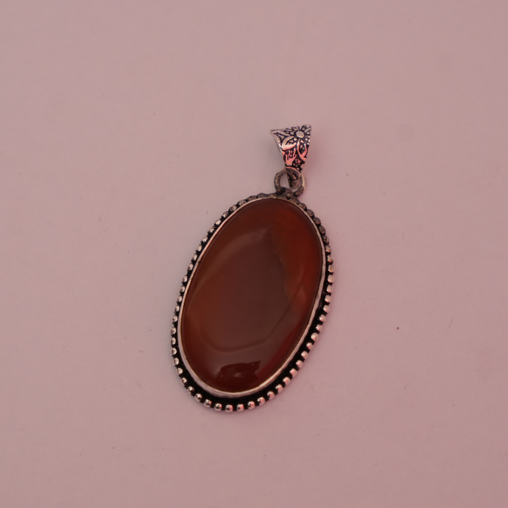 Red Carnelian German Silver Pendant- Oval Shaped- Dotted Border