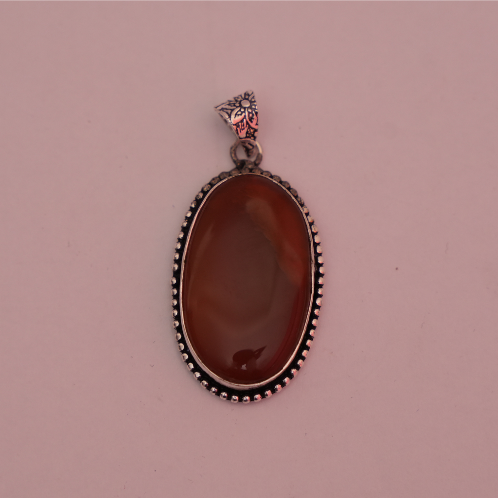 Red Carnelian German Silver Pendant- Oval Shaped- Dotted Border